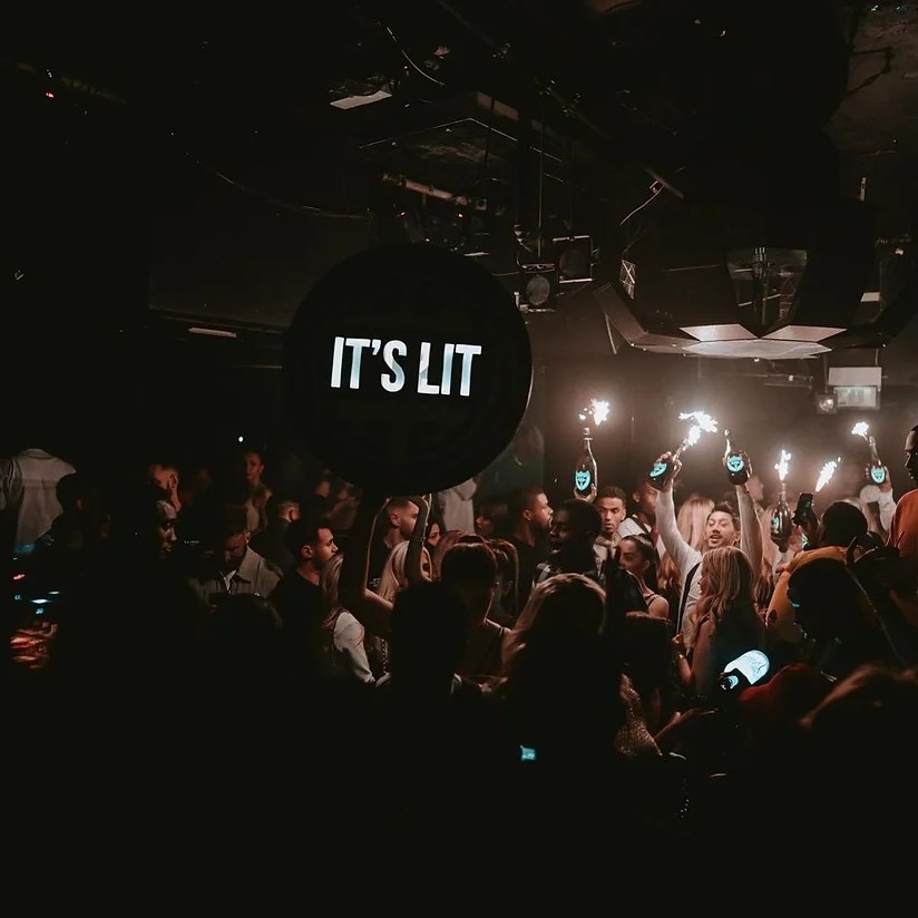 Libertine Nightclub table clients partying in the club.