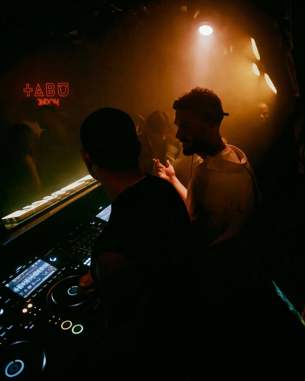 The view from a Tabu London VIP table behind the Tabu DJ booth where you can see the DJ.