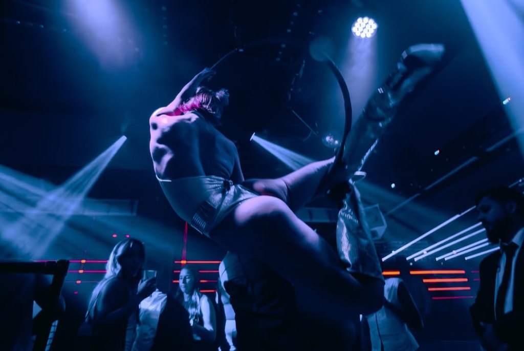 An aerialist performing at Funky Buddha nightclub in London.